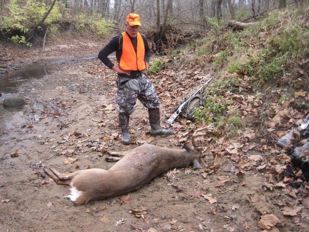 John Lamphere Admiring A Hunting Partners Monster Buck